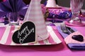 Pink and purple theme party table setting decorations Royalty Free Stock Photo