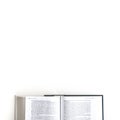 Flat lay: open Bible on white background