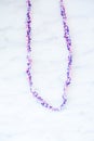 Pink, purple and white crocheted necklace Royalty Free Stock Photo