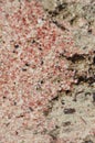 Pink quartz sand close up. Crete island