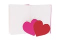 Pink and red paper heart on blank open book isolated on white Royalty Free Stock Photo