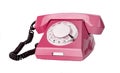 Pink retro phone isolated on white background. Telephone with rotary dial Royalty Free Stock Photo