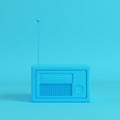 Pink retro styled radio on bright blue background in pastel colo Royalty Free Stock Photo