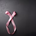 pink ribbon breast cancer on pink background.