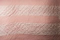 Pink ribbon quilted onto a patchwork blanket Royalty Free Stock Photo