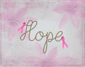 Pink ribbon symbols with word hope in rope design