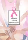 Pink Ribbon and text with breast cancer awareness women putting hands together Royalty Free Stock Photo