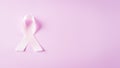 Pink ribbons sign for breast cancer awareness. Symbolic bow color raising awareness on women`s breast tumor. Healthcare, medicine Royalty Free Stock Photo