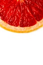 Pink ripe grapefruit slice on white isolated background Royalty Free Stock Photo