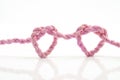 Pink rope heart shaped symbol