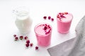 Pink rose and beetroot latte coffee or tea with milk, top view Royalty Free Stock Photo