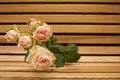 Pink rose bouquet closup on a wooden bench Royalty Free Stock Photo
