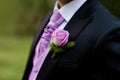 Pink Rose in a Dark Groom Suit