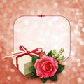 Pink rose flower arangement and a gift and a frame Royalty Free Stock Photo