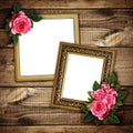 Pink rose flowers arrangement on frames on wood Royalty Free Stock Photo