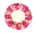 Pink rose flowers cream birthday cake top view isolated on white background, path Royalty Free Stock Photo