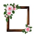 Pink rose flowers and green leaves in a corner floral arrangements on brown wooden frame Royalty Free Stock Photo