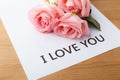 Pink rose and gift card of message I Love You Royalty Free Stock Photo