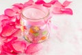 Pink rose on rose petals and bath salt Royalty Free Stock Photo