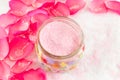 Pink rose on rose petals and bath salt Royalty Free Stock Photo