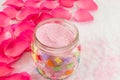 Pink rose on rose petals and bath salt Royalty Free Stock Photo