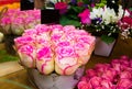 Pink roses basket with empty price tag. Royalty Free Stock Photo