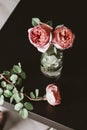 pink roses on the black table Royalty Free Stock Photo