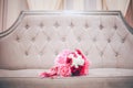 Pink roses bouquet and pearls on abstract blur background. Royalty Free Stock Photo