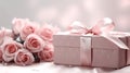 Pink roses and gift with satin ribbon on a soft background, ideal for bridal showers or Valentine\'s Day