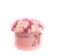 Pink roses isolated on white background. Flowers in a round box with a bow, a gift for the holiday. Copy space Royalty Free Stock Photo