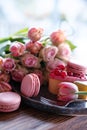 Pink roses and sweet pastrys