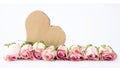 Pink roses and wooden heart isolated on white background texture vintage Royalty Free Stock Photo