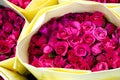 Pink roses with yellow paper bouquet