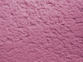 Pink roughcast plaster texture as background with space for text Royalty Free Stock Photo