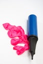 Pink rubber balloons and inflatable pump Royalty Free Stock Photo