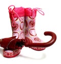 Pink rubber knee-boots and umbrella Royalty Free Stock Photo