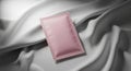Pink Sachet on Silk Fabric Mockup Royalty Free Stock Photo
