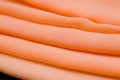Pink, salmon silk tender colored textile, elegance rippled material Royalty Free Stock Photo