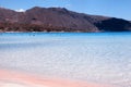 Pink sand beach with azure clear water of famous Elafonisi, Crete, Greece. Royalty Free Stock Photo