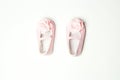 Pink sandals for a little girl. First shoes for baby girl on a light background Royalty Free Stock Photo