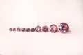 Pink sapphires diamonds in different size in one row Royalty Free Stock Photo