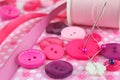 Pink scene of sewing, haberdashery items. Royalty Free Stock Photo