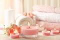 Pink scented candles on white wooden background Royalty Free Stock Photo