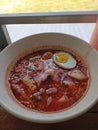 Pink seafood noodles is spicy