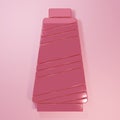 Pink Sewing thread on spool icon isolated on pink background. Yarn spool. Thread bobbin. Minimalism concept. 3D render Royalty Free Stock Photo