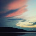 Pink shades of sunset on the clouds. Kenozero park Royalty Free Stock Photo
