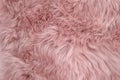 Pink sheepskin rug background sheep fur Wool texture