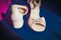 Pink shoes with small heel on dark background Royalty Free Stock Photo