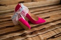 Pink shoes and wedding garter