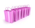 Pink shopping bags in a row